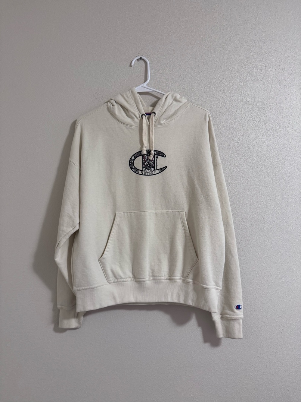 Champion Cream Pullover Hoodie with patterned C Logo